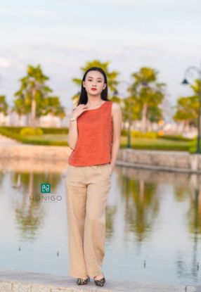 Hiển thị chi tiết cho Set bộ linen đẹp gồm quần be gừng ống rộng và áo nút 2 sườn cam cháy Ảnh của Set bộ linen đẹp gồm quần be gừng ống rộng và áo nút 2 sườn cam cháy